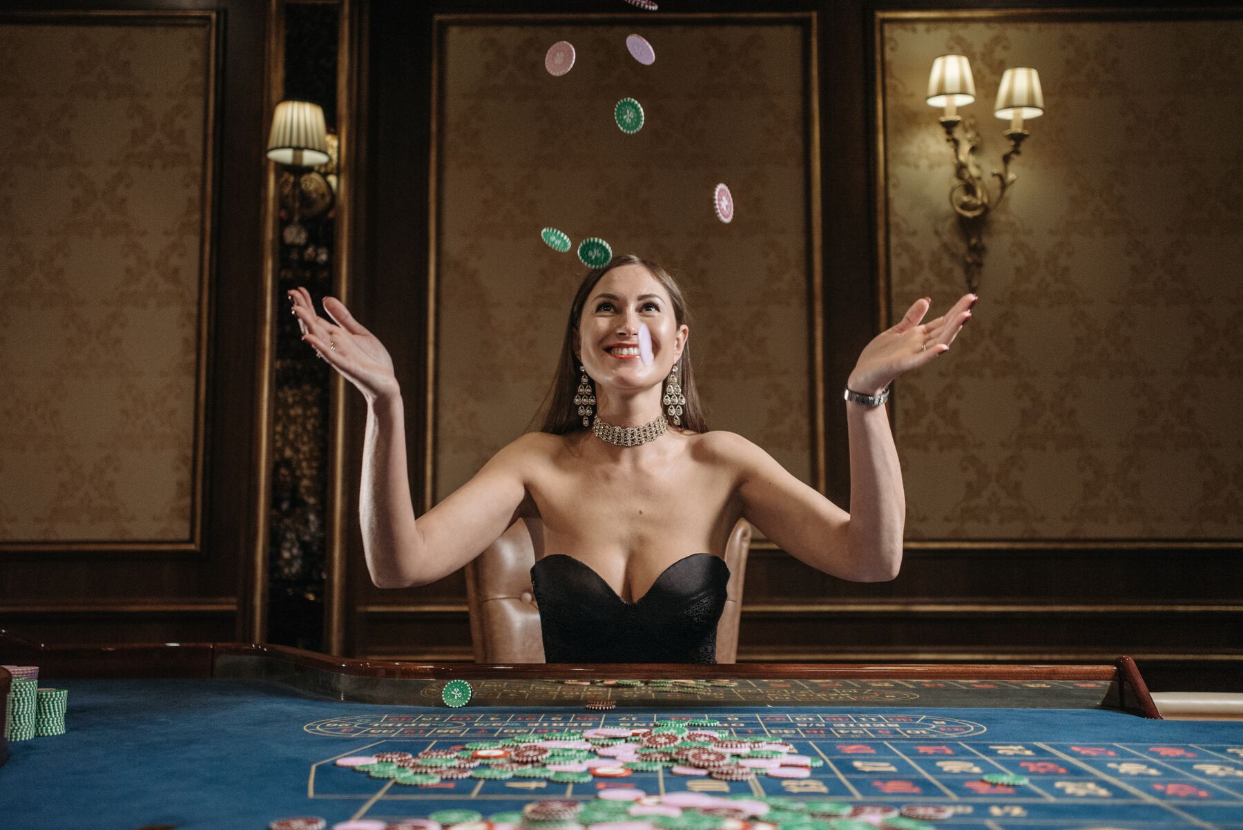 sexy girl in casino playing poker